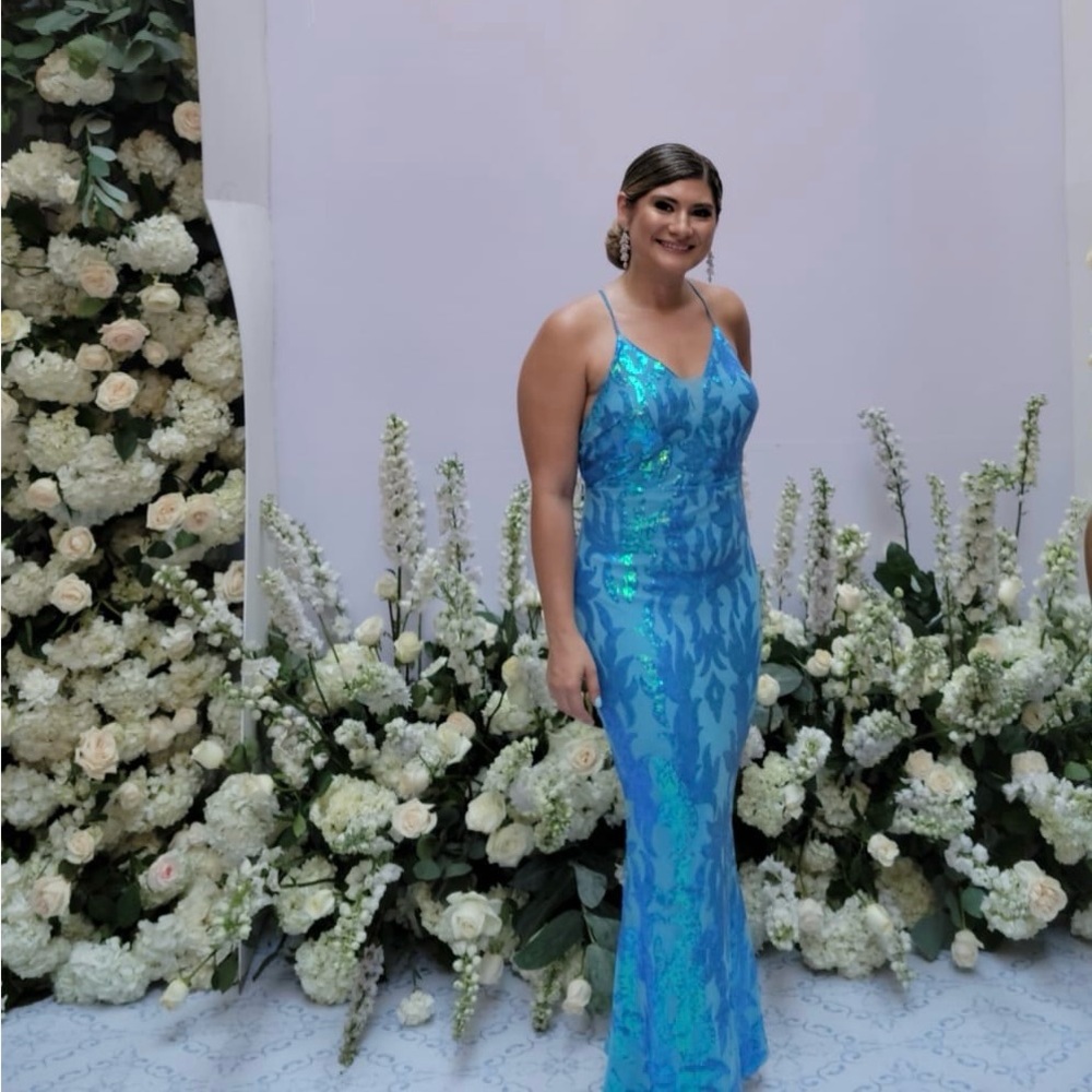 Elegant long gown with blue sparkles.